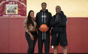 AJ Dybantsa (Brockton, Mass.) with his mother, Chelsea, and father, Ace. (Ethan Fuller/ NE Basketball Journal)