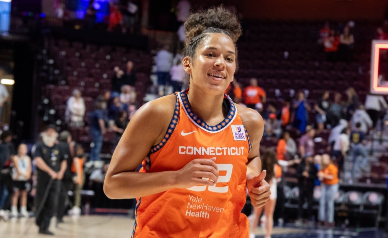 Veronica Burton (Newton, Mass.) has found a home in the WNBA with the Connecticut Sun. (Erica Denhoff/Getty Images)